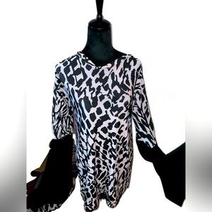 Custom made dress with flared sleeves